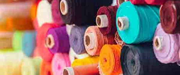 colorsful fabric silk rolls in textile shop industry from india